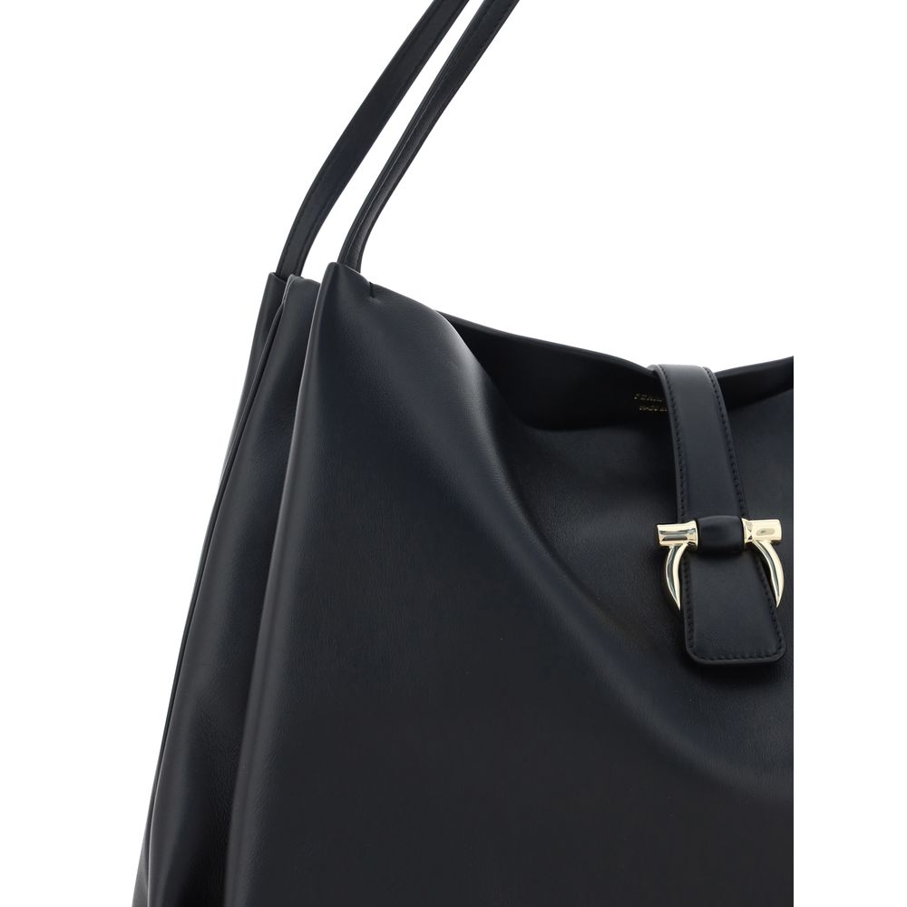 Ferragamo Mia Tote Bag black calfskin side profile, lily bellows detail