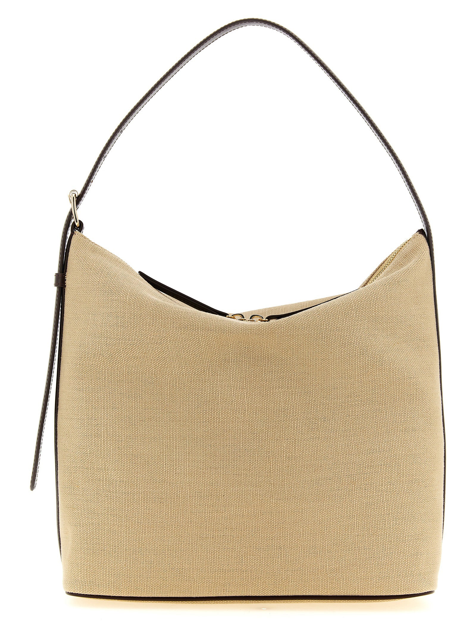 A.P.C. Vera shoulder bag in beige cotton canvas and smooth brown leather details with adjustable strap from The Exclusive Line Singapore.