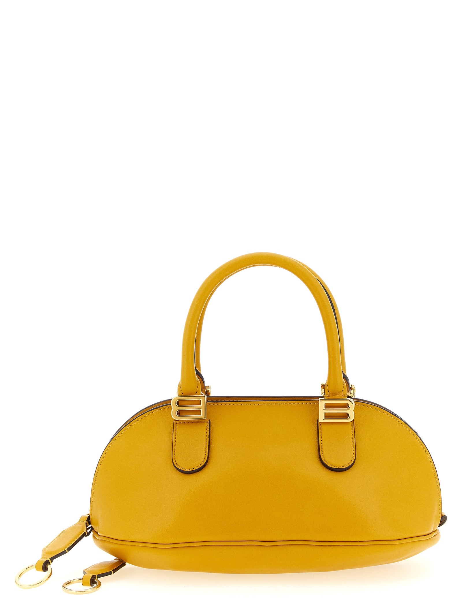 Balenciaga Mini Bolero Bowling Bag in curry yellow calfskin leather with aged-gold B logo hardware, front view.