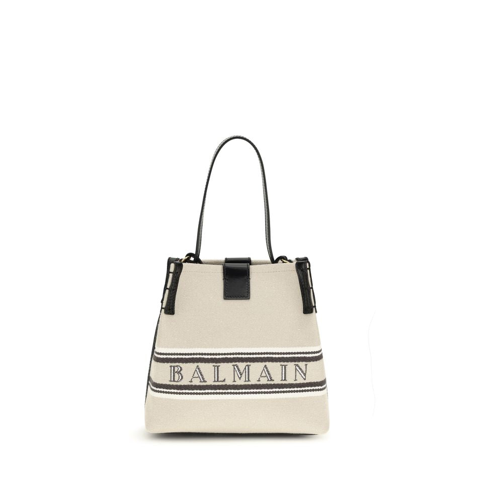 Balmain Release Bucket Bag in Beige Canvas & Calfskin from The Exclusive Line Singapore.