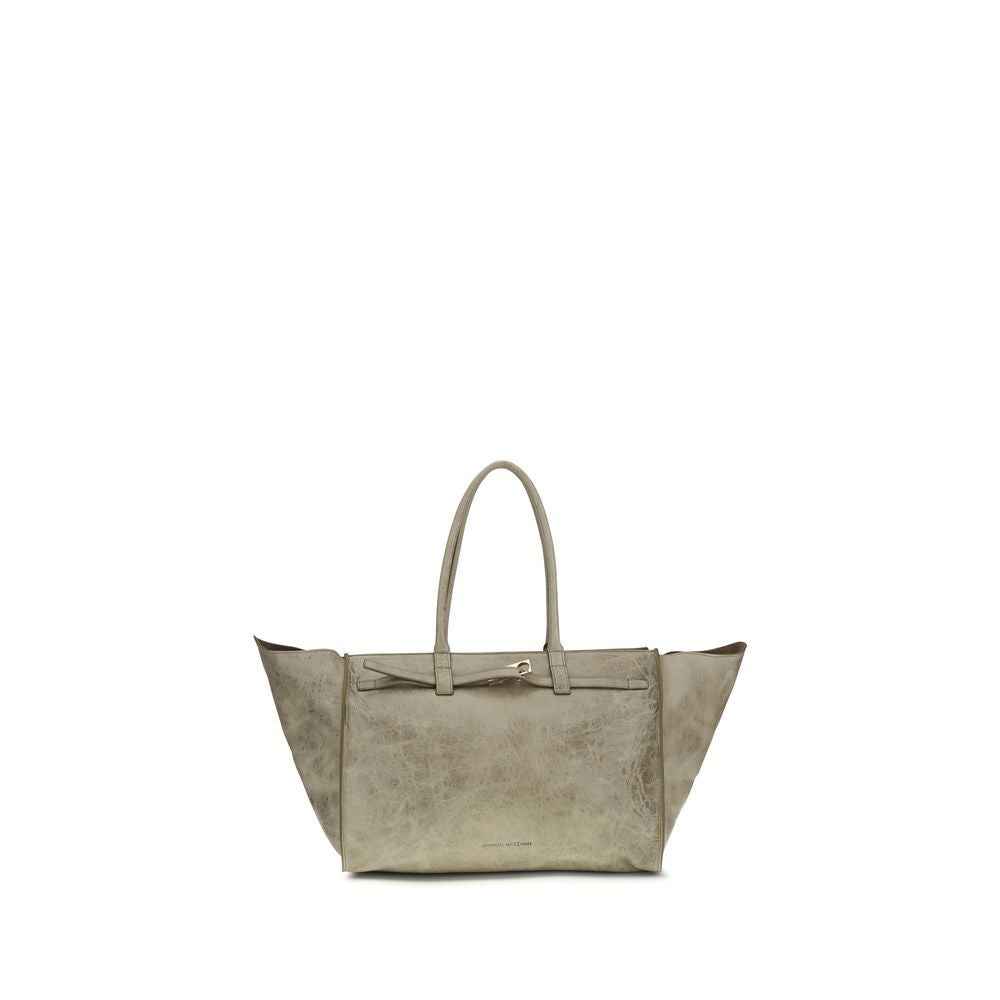 Benedetta Bruzziches Mame Weekend Shoulder Bag in Beige suede with silver-tone hardware and signature winged side gussets from The
Exclusive Line Singapore.
