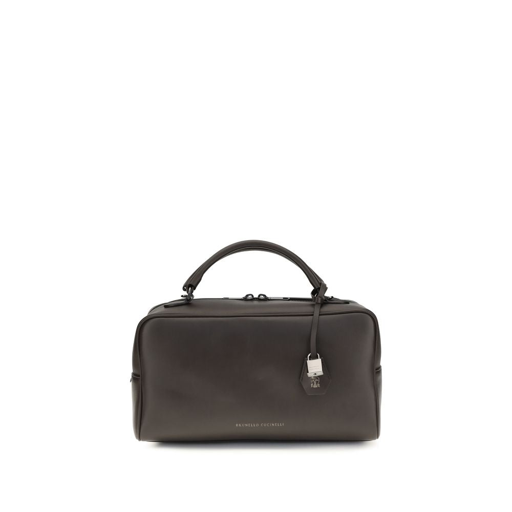 Brunello Cucinelli Explorer Boston Bag in rust brown glossy nappa leather featuring a hidden padlock key case and double top handles.