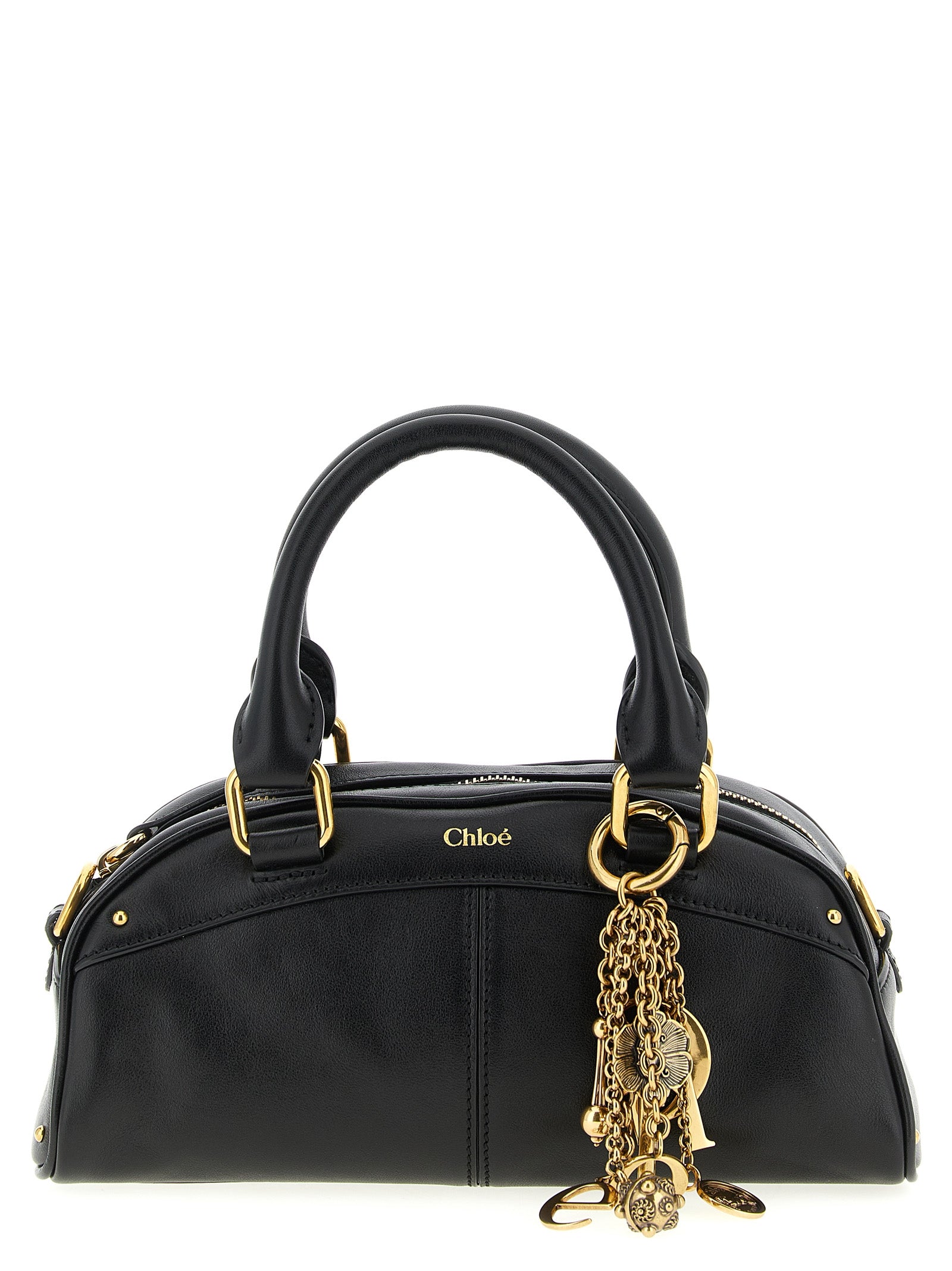 Chloé Bowling Bag Small in black smooth calfskin leather featuring a structured rounded silhouette, dual handles, and a gold-tone logo charm key chain from The Exclusive Line Singapore.
