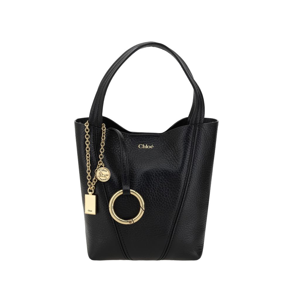 Chloé Spin Tote Bag Small in Black Grained Leather with Chloé medal and charm from The Exclusive Line Singapore.