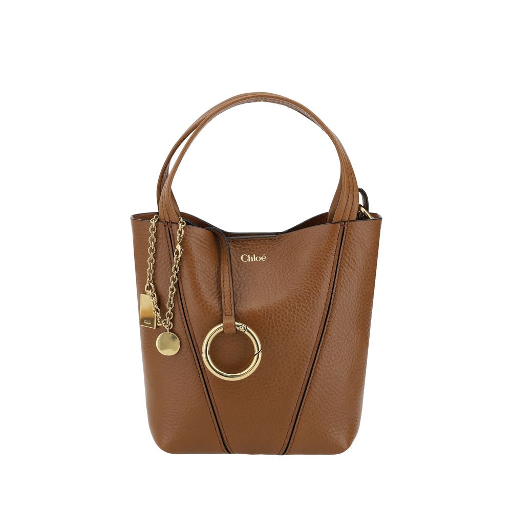 Chloé Spin Tote Bag Small in Clay Brown Grained Leather with Chloé charms and medal from The Exclusive Line Singapore.