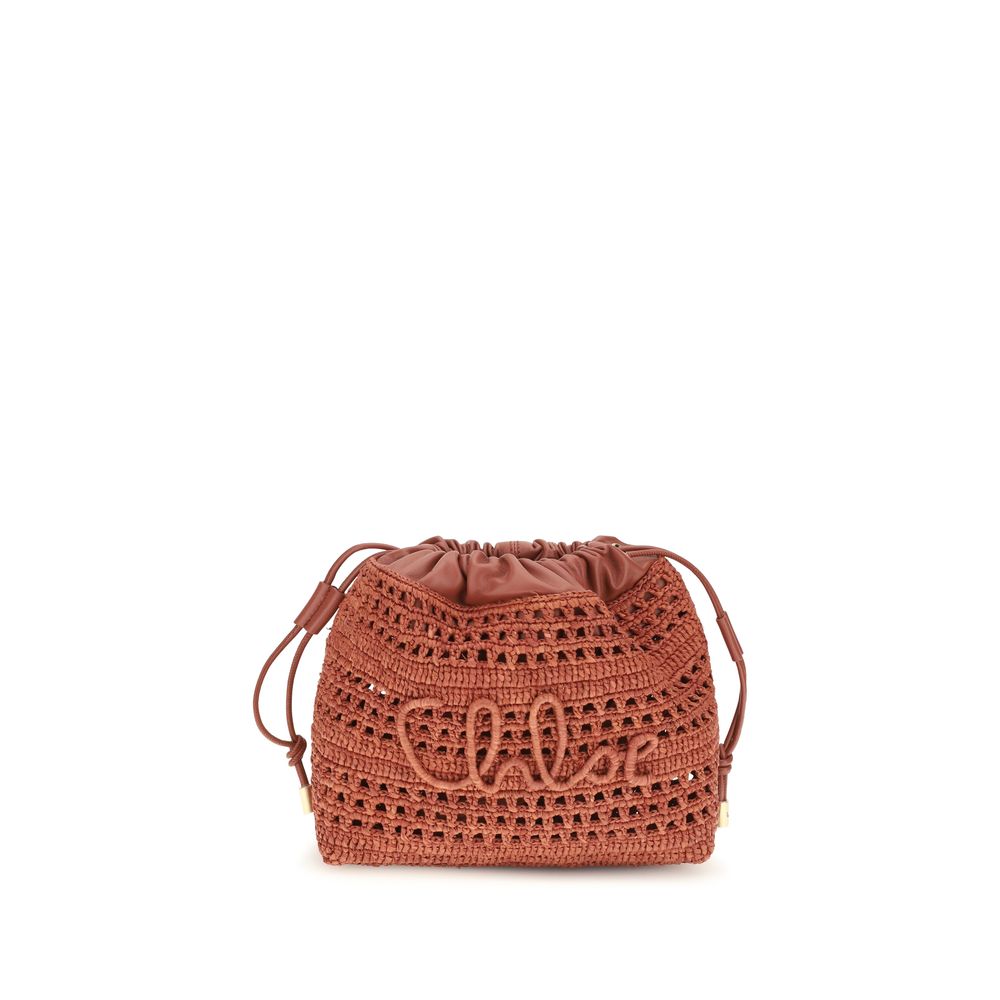 Chloé Summer Banana mini drawstring bag in ginger red hand-woven raffia and lambskin leather featuring an embroidered logo and gold-tone charms from The Exclusive Line Singapore.
