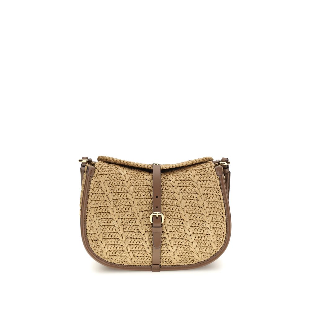 Etro Medium Pony Bag in brown crocheted raffia and calfskin leather—available at The Exclusive Line Singapore.