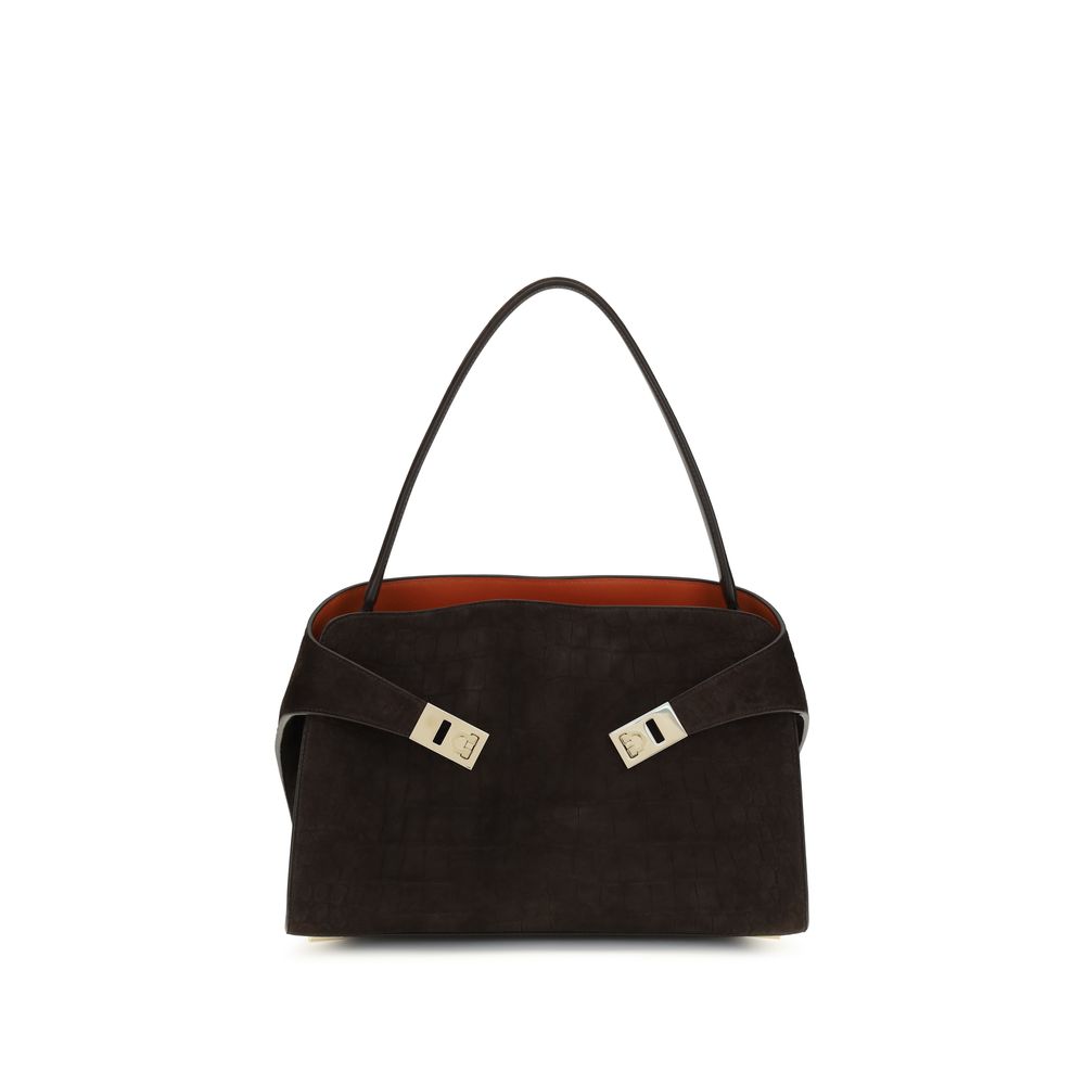 Ferragamo Hug Medium Soft Shoulder Bag in Testa di Moro dark brown alligator-print and suede leather with gold hardware at The Exclusive Line Singapore.