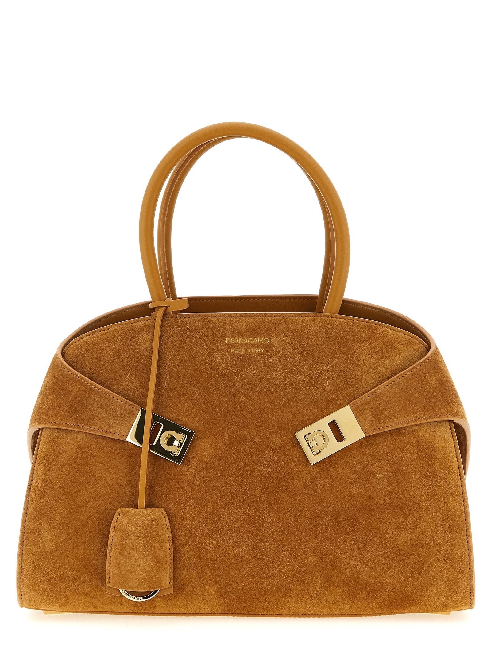 Ferragamo Hug Handbag in Natural Brown calfskin suede with gold Gancio buckles at The Exclusive Line Singapore.
