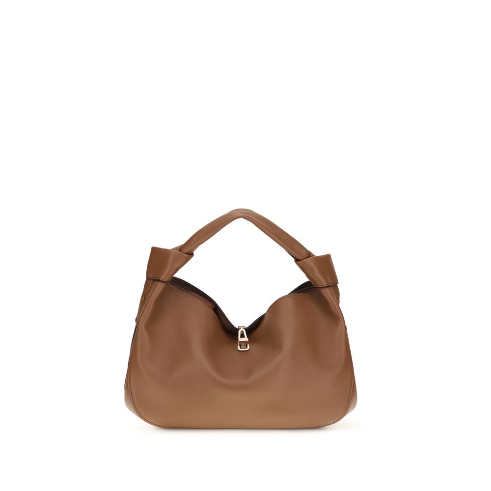 Gabriela Hearst Antonia Small Hndbag in Cognac leather featuring a roaunded hobo silhouette and turn-lock buckle.