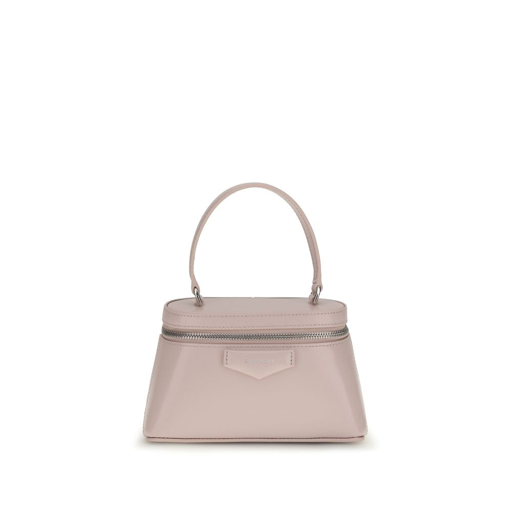 Givenchy Antigona Vanity Bag in Baby Pink Box Leather with silver chain and top handles from The Exclusive Line Singapore.