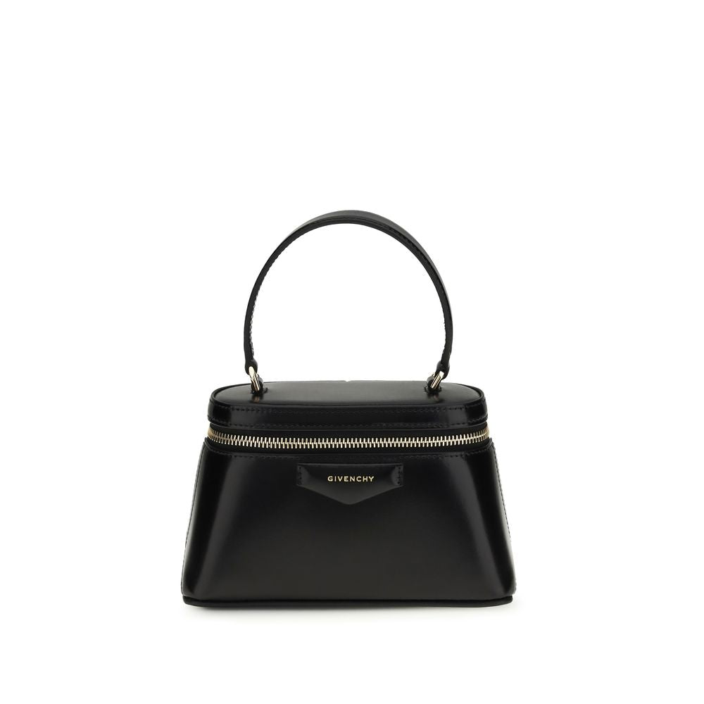 Givenchy Antigona Vanity Bag in Black Box Leather with gold chain strap from The Exclusive Line Singapore.