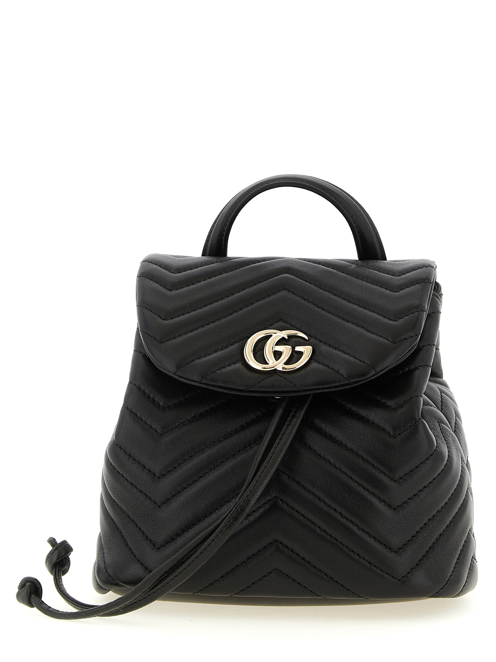 Gucci GG Marmont Mini Backpack in black chevron matelassé lamb leather with gold Double G logo.