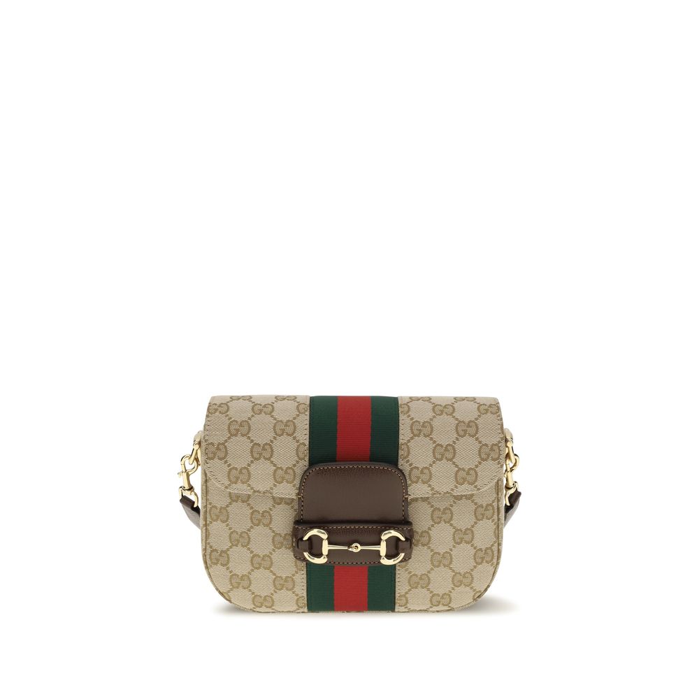 Gucci Horsebit 1955 Small Shoulder Bag in sand and brown GG canvas featuring dark brown leather trim, the iconic Horsebit hardware, and a classic Web stripe.
