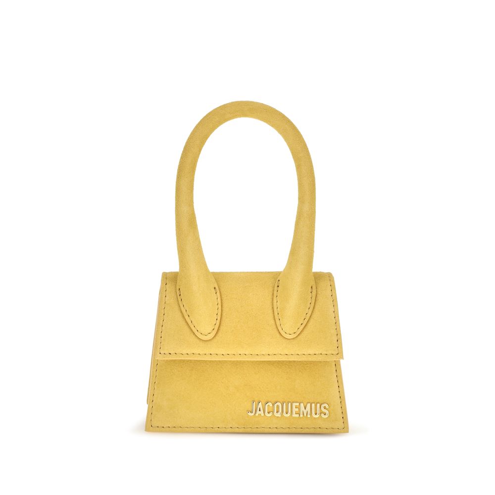 Jacquemus Le Chiquito dark yellow suede mini handbag with gold logo hardware.