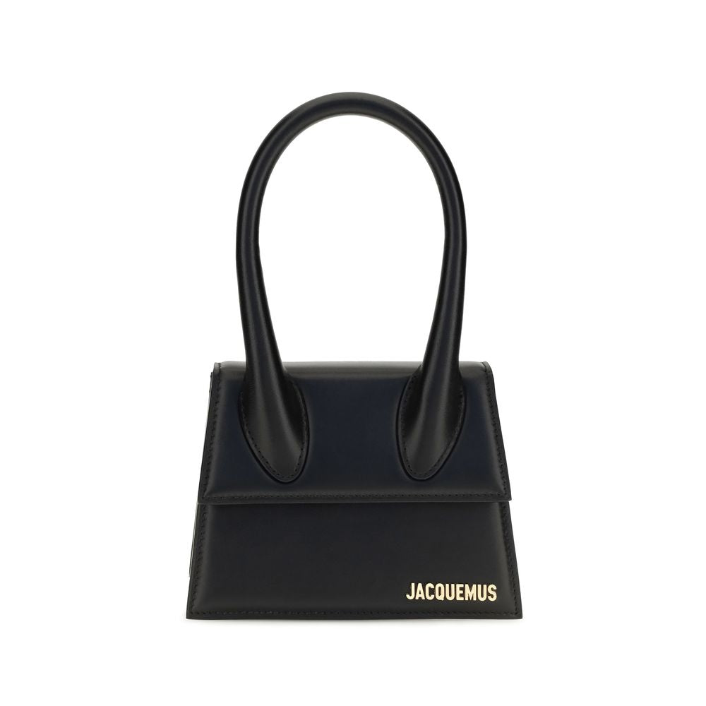 Jacquemus Le Chiquito Medium black leather top handle bag with gold hardware.