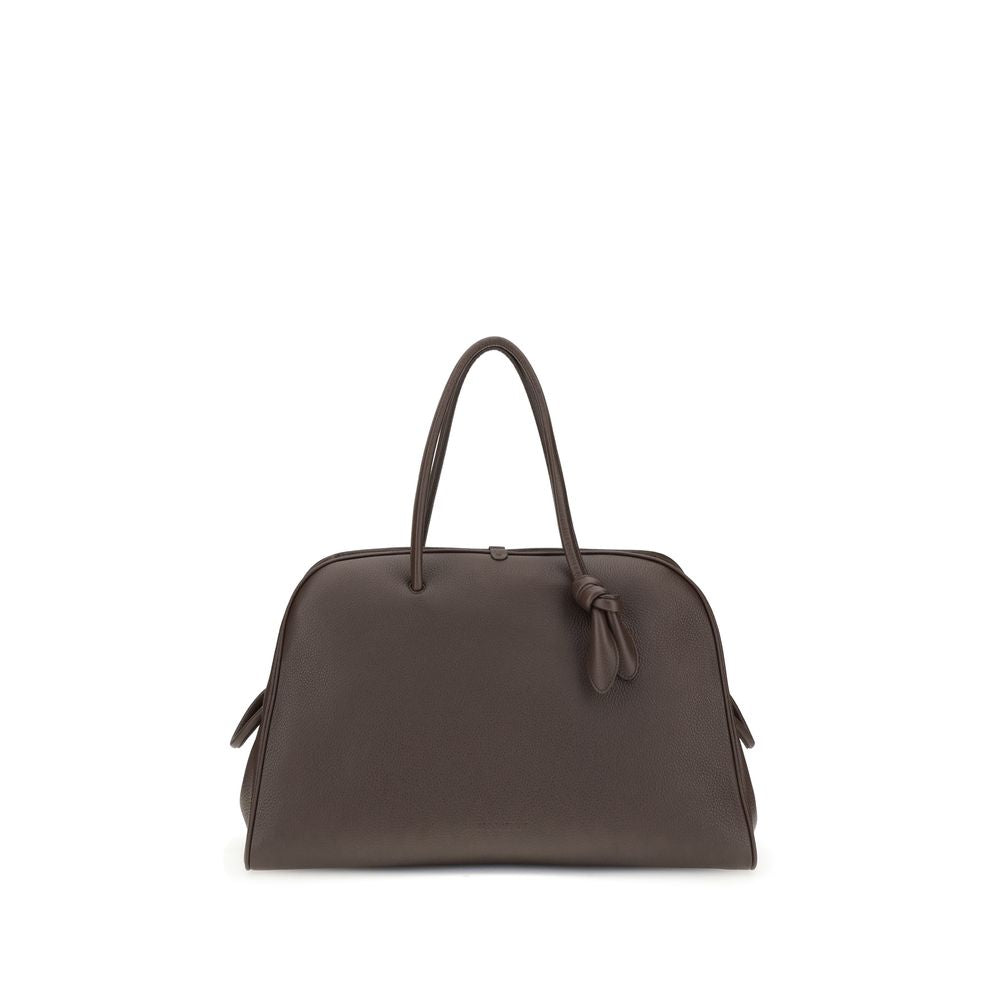 Jacquemus Le Grand Turismo dark brown grained leather soft bowling bag with bow detail, available at The Exclusive Line Singapore.