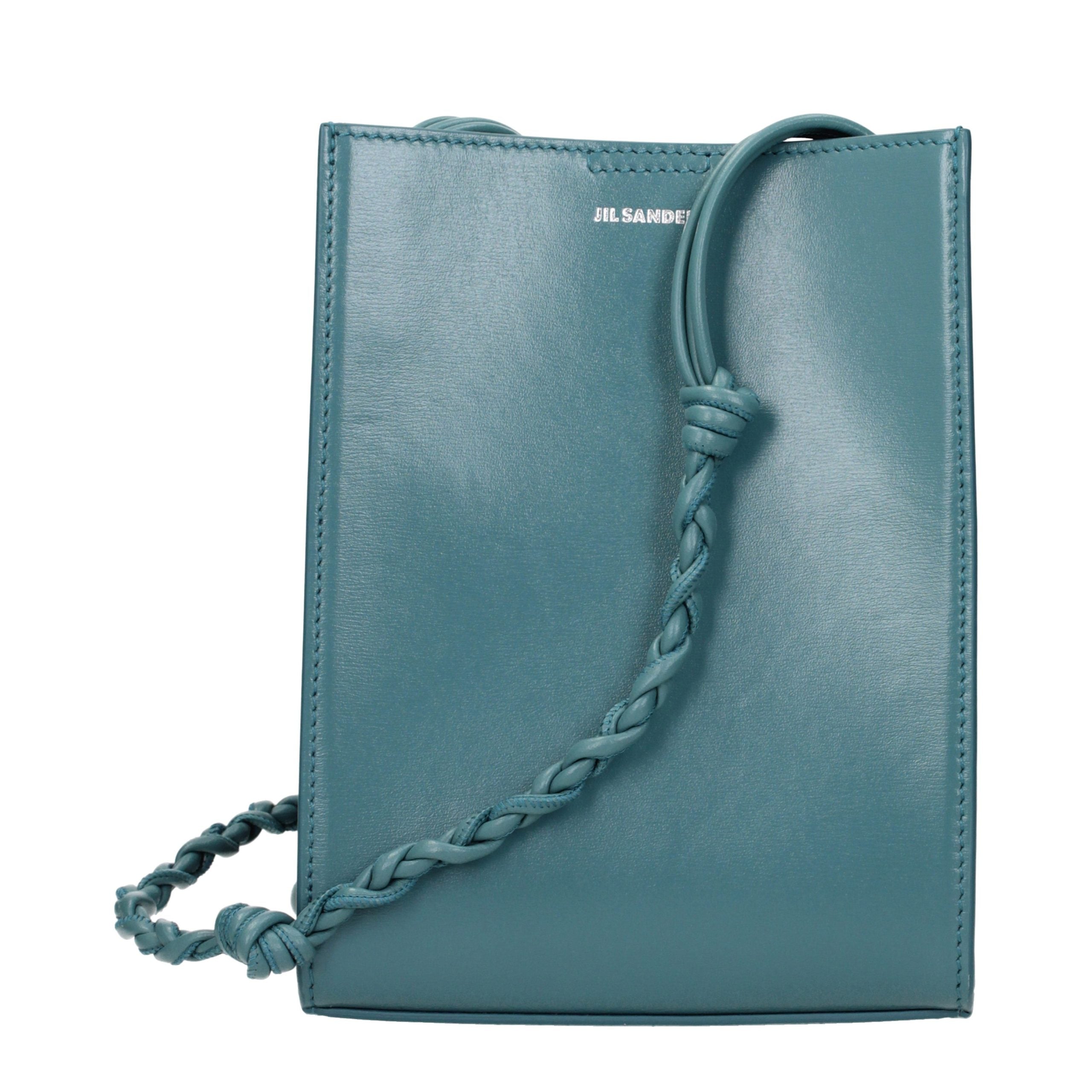 Jil Sander Tangle Small Shoulder Bag in blue lagoon calf leather featuring a hand-knotted shoulder strap.