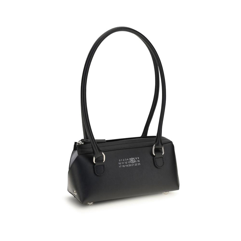 Side view of MM6 Maison Margiela Bauletto shoulder bag in black smooth calf leather with numeric logo, available at The Exclusive Line Singapore.