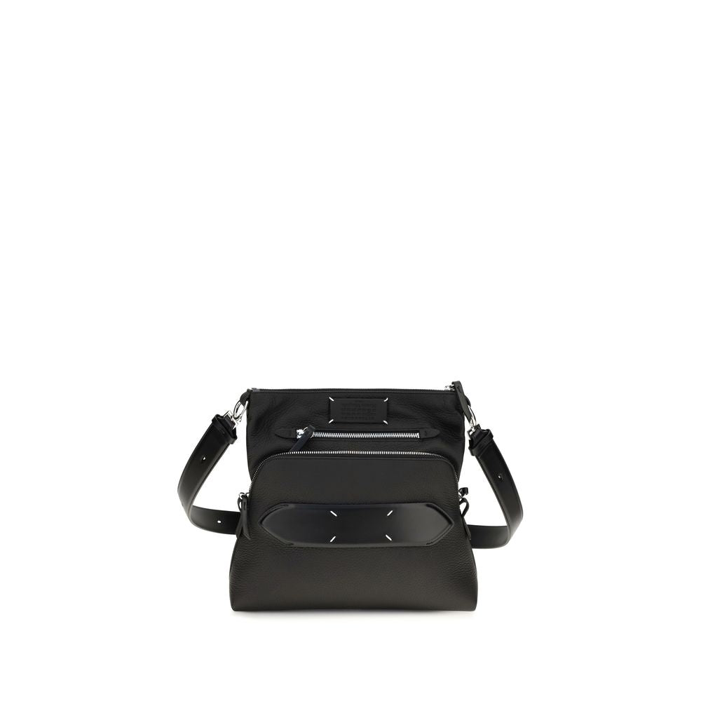 Maison Margiela 5AC City Bag in black supple deer leather featuring top zip closure, numeric logo label, and detachable shoulder strap.