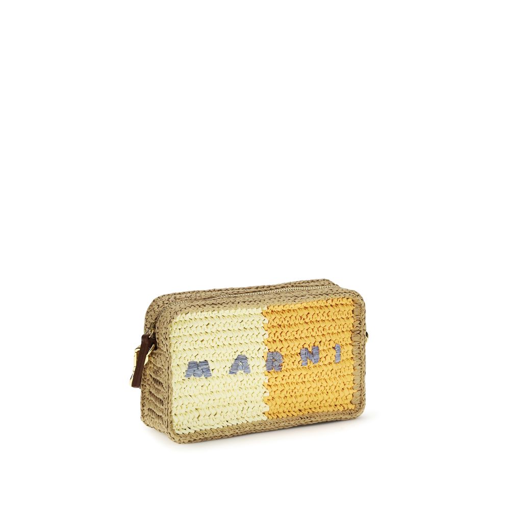 Side view of Marni Seaside Camera Bag in yellow and orange handwoven paper raffia with natural raffia logo - Available at The Exclusive Line, Singapore.