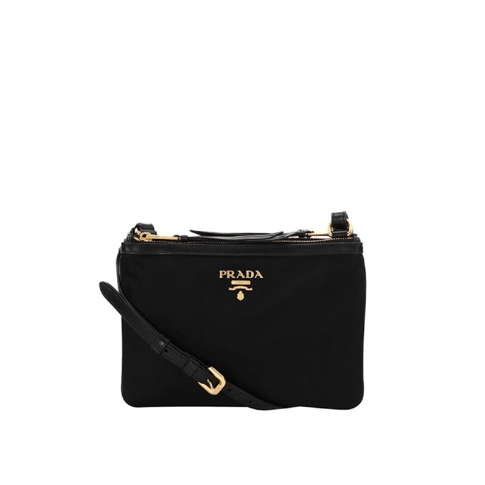 Prada Double Zip Crossbody Bag in Black nylon with gold-tone logo and detachable strap.
