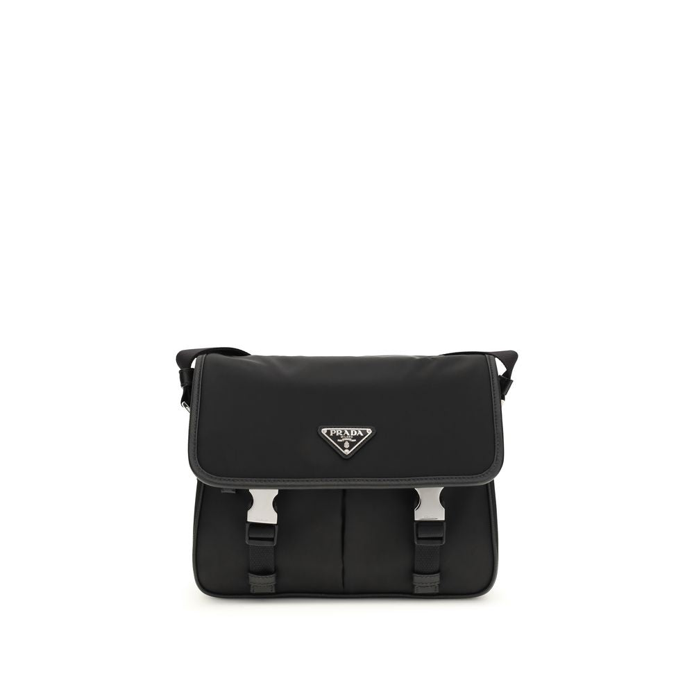 Prada Re-Nylon and Saffiano leather messenger bag in black featuring enameled triangle logo and side-release buckle flap closure.
