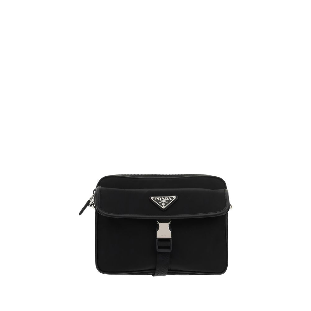 Prada Re-Nylon and Saffiano leather messenger bag in black featuring a detachable mini pouch and enameled triangle logo - The Exclusive Line Singapore.