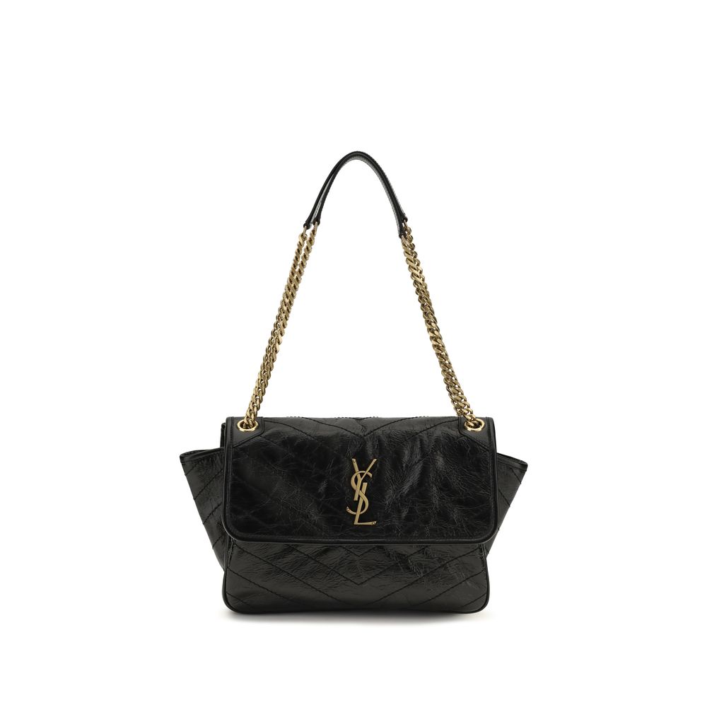 Saint Laurent Niki Tripouch in black chevron-quilted vintage leather with bronze-tone YSL logo and sliding chain strap.