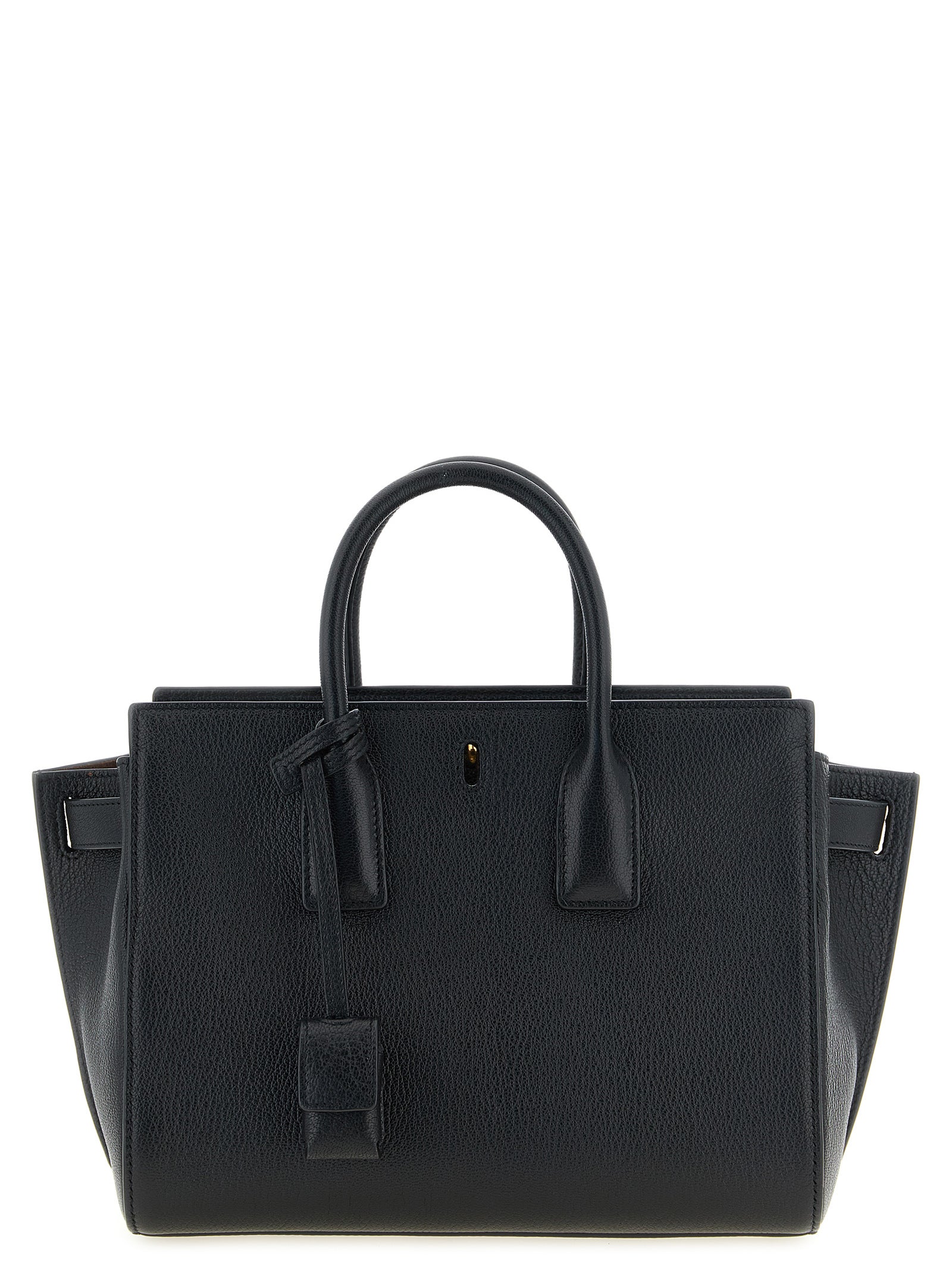 Saint Laurent Sac de Jour Large East/West tote bag in black grained calfskin leather featuring tubular top handles, accordion sides, and a bronze CASSANDRE padlock charm from The Exclusive Line Singapore.