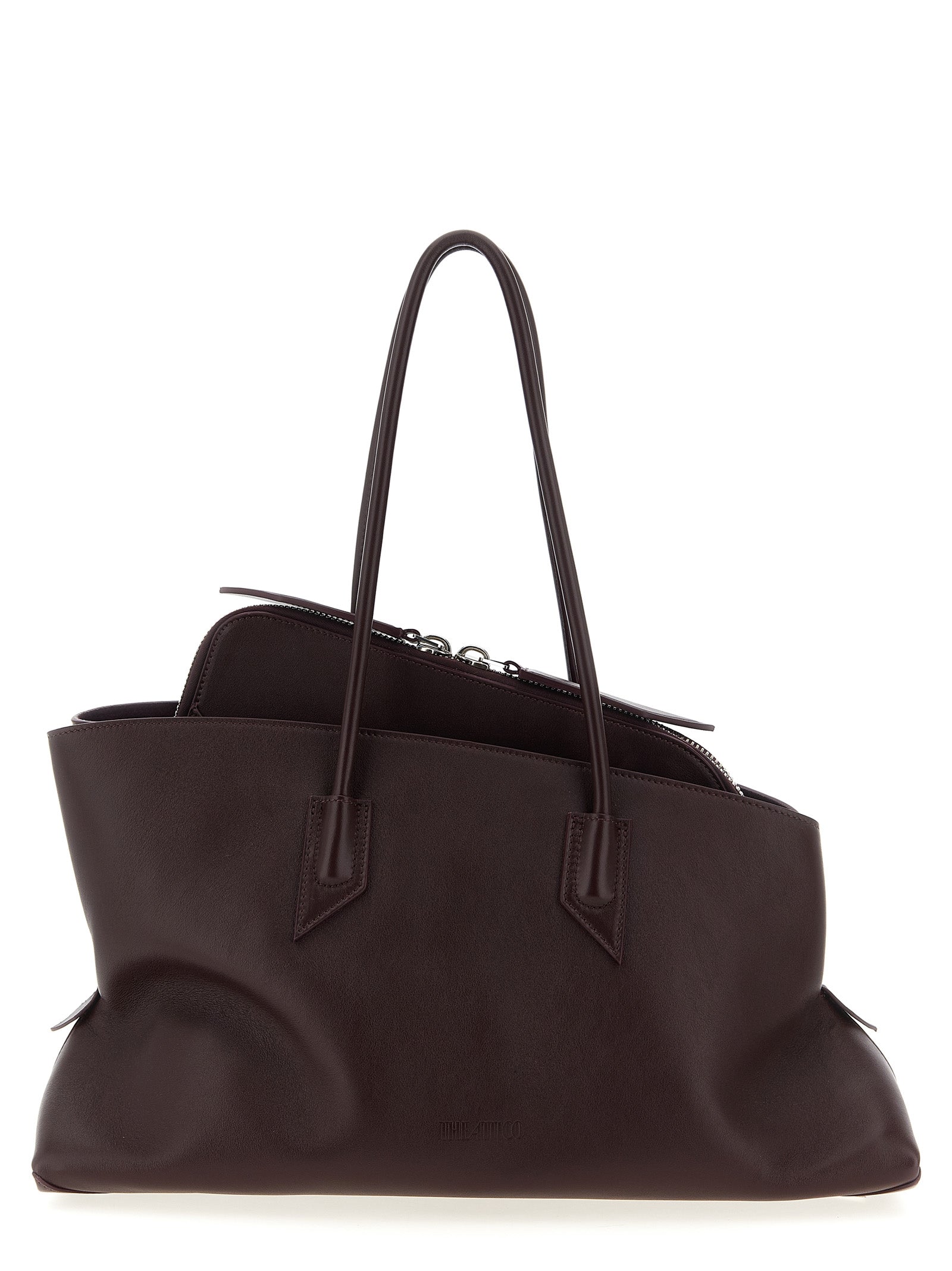 The Attico La Passeggiata Medium Top Handle Bag in deep dark violet smooth leather with structured tubular handles from The Exclusive Line Singapore.