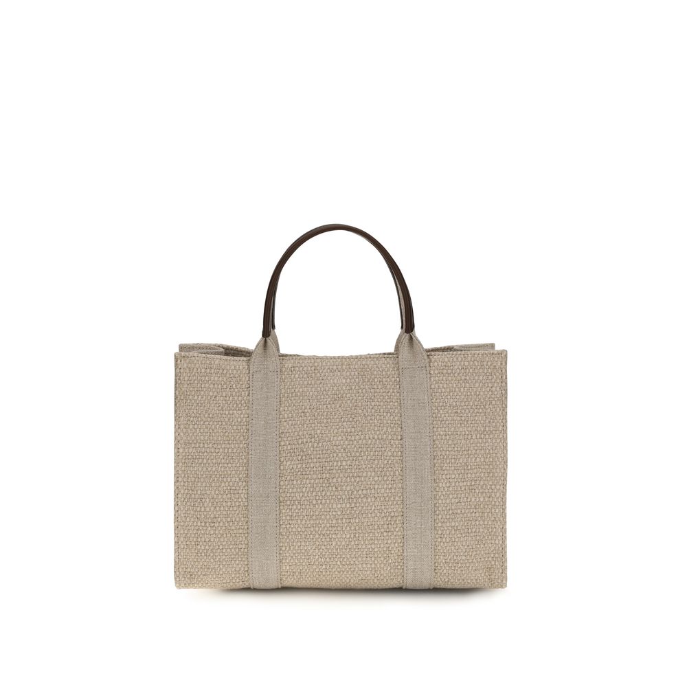 The Row Georgia Tote Bag in Canvas Beige with black leather top handles, curated by The Exclusive Line Singapore.