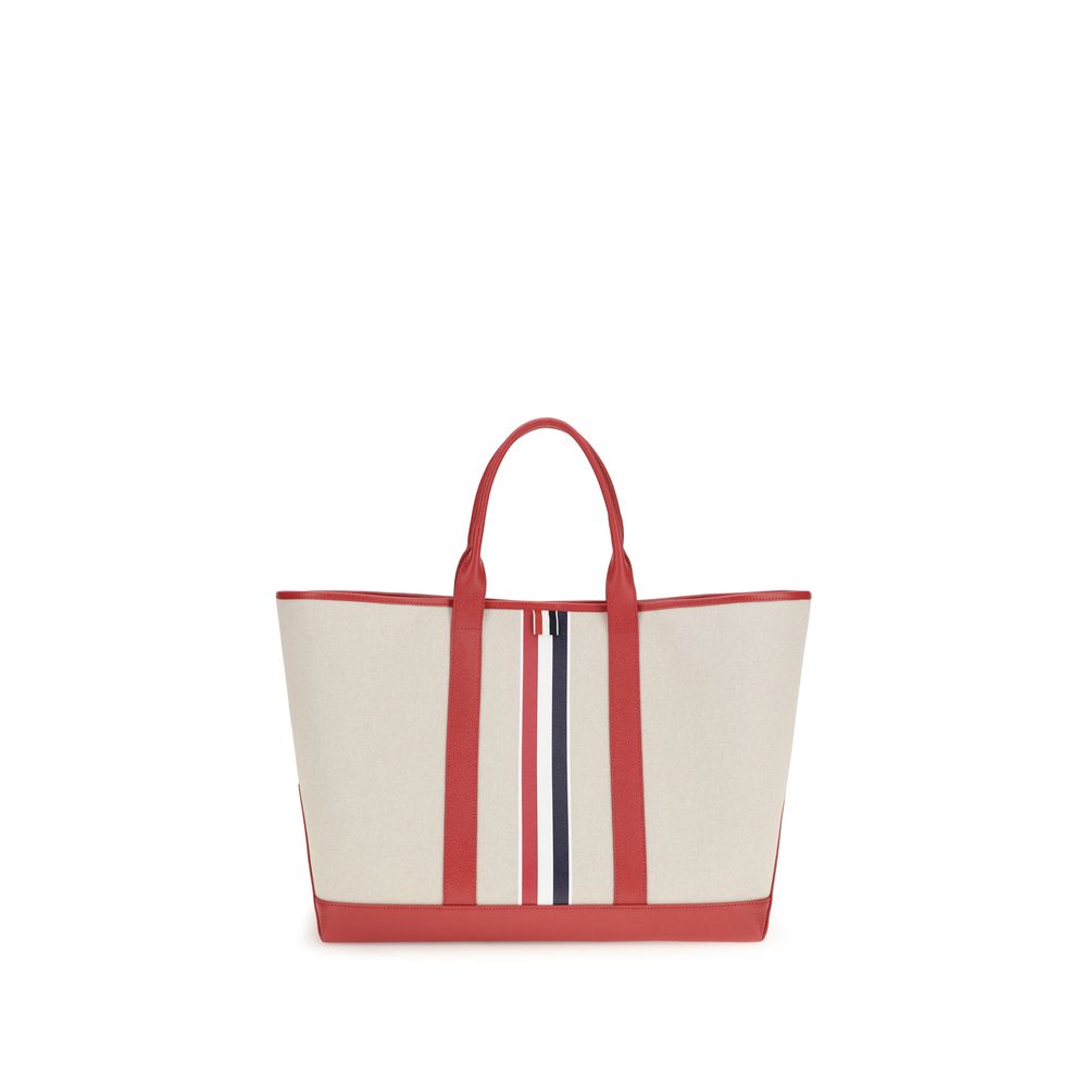 Thom Browne RWB Stripe Medium Tool Tote in beige cotton canvas and red leather, available at The Exclusive Line Singapore.