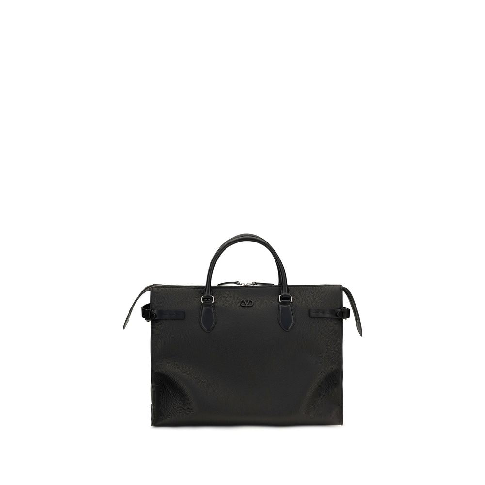 Valentino Garavani Antibes duffle bag in black grained leather with palladium hardware and removable strap.
