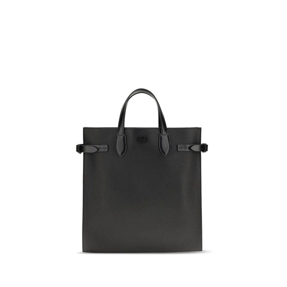 Valentino Garavani Antibes medium tote bag in black grained leather with palladium hardware and suede lining.