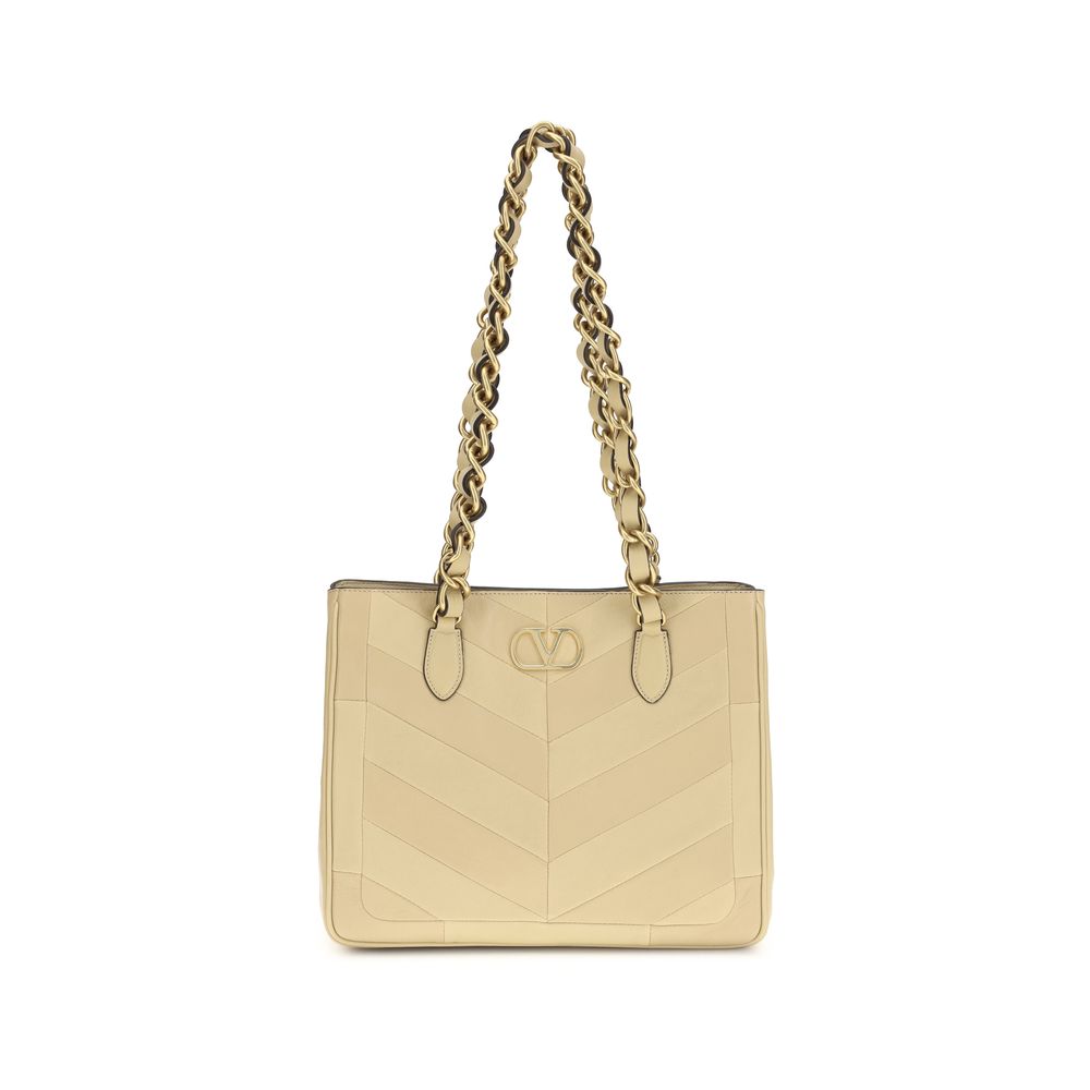 Valentino Garavani Laseine Small Shopping Bag in Gold Nappa Leather from The Exclusive Line Singapore.