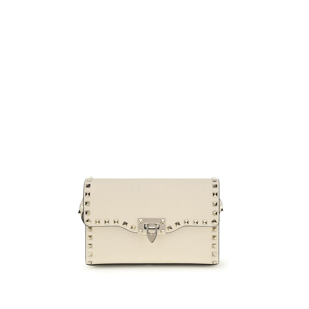 Valentino Garavani Rockstud Small Crossbody Bag in Cream from The Exclusive Line Singapore.