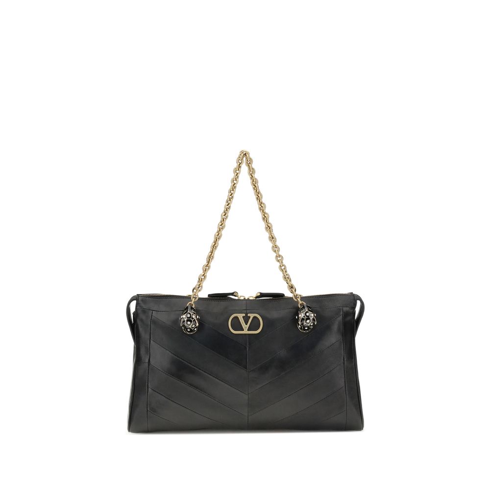 Valentino Garavani Panthea medium shoulder bag in black chevron nappa leather with Swarovski crystal feline heads.