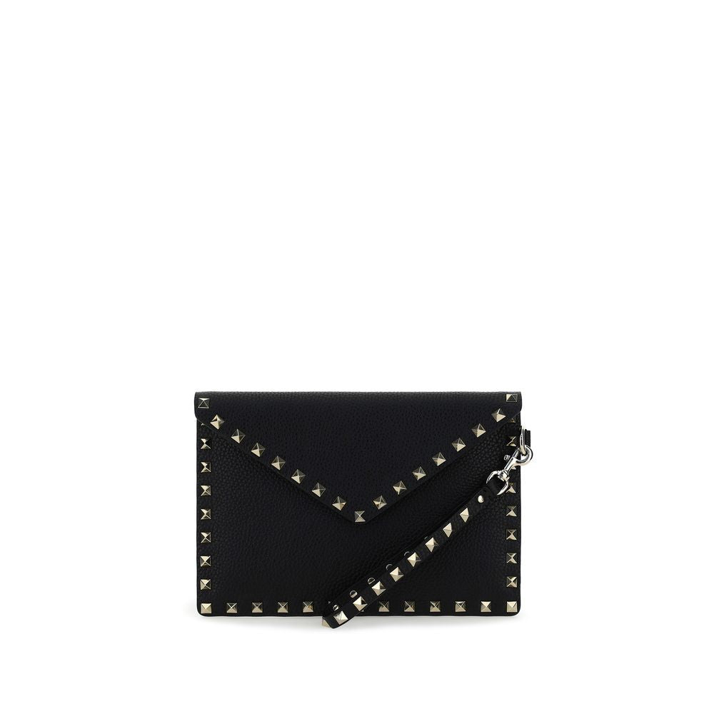 Valentino Garavani Rockstud clutch bag in black grained calfskin leather with platinum finish studs and wristlet strap.