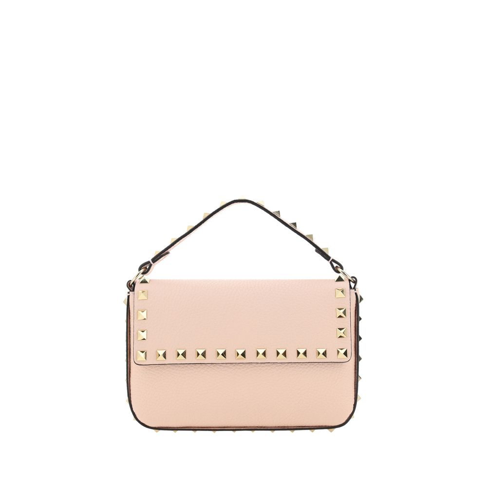 Valentino Garavani Rockstud Pouch in Rose Quartz pastel pink grainy calfskin leather with platinum-finish studs.