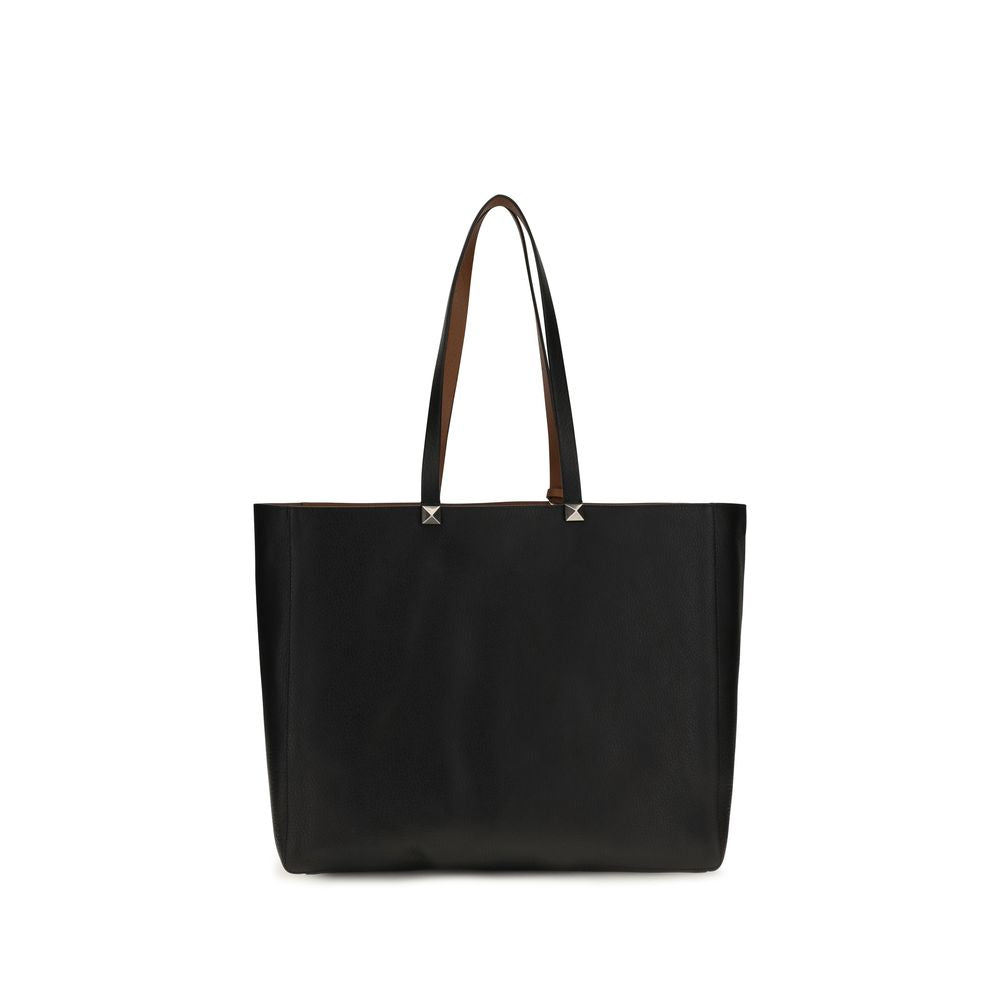 Valentino Garavani Rockstud reversible elk print calfskin tote in black and saddle brown with two-tone maxi studs.