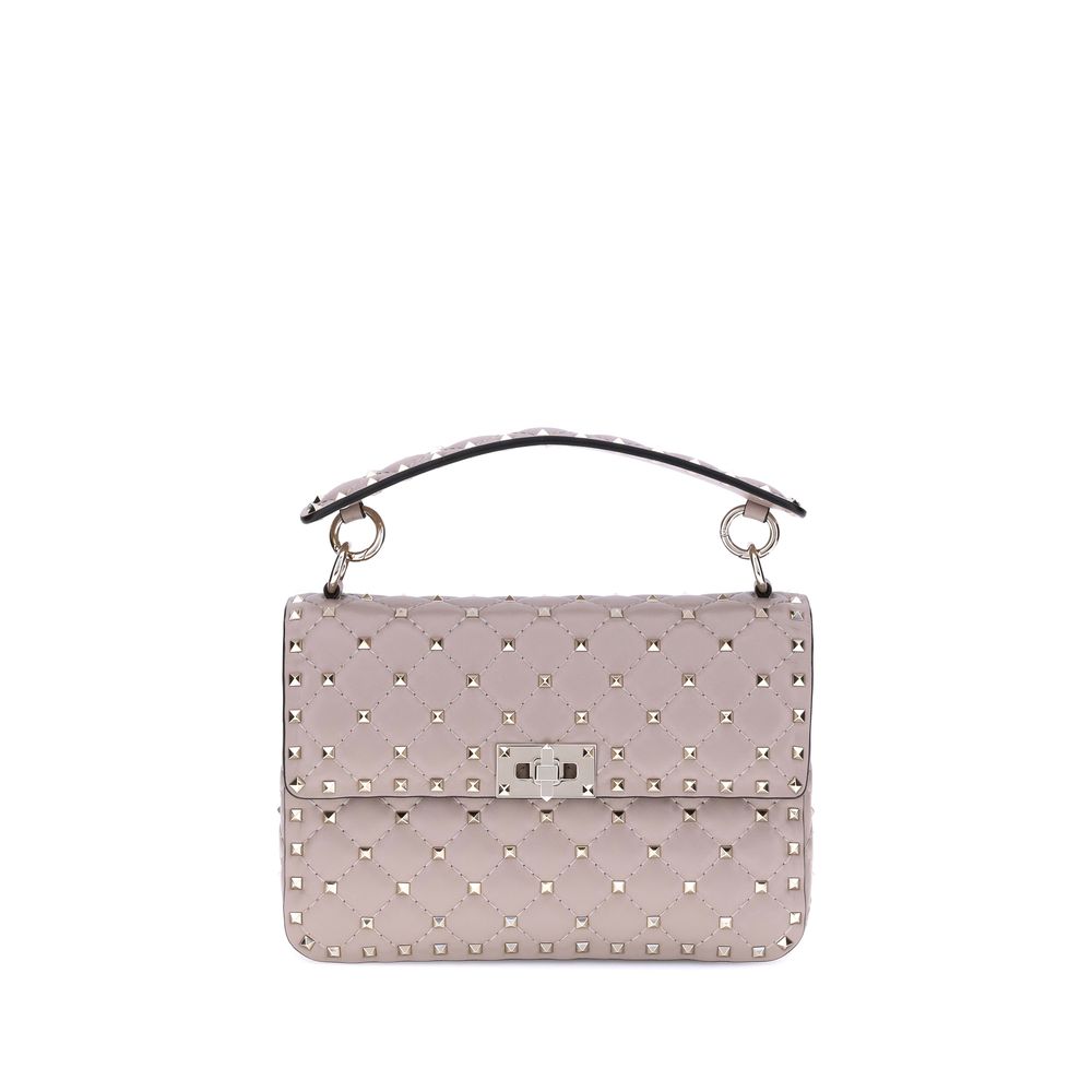 Valentino Garavani Rockstud Spike medium shoulder bag in poudre quilted nappa leather with platinum studs.