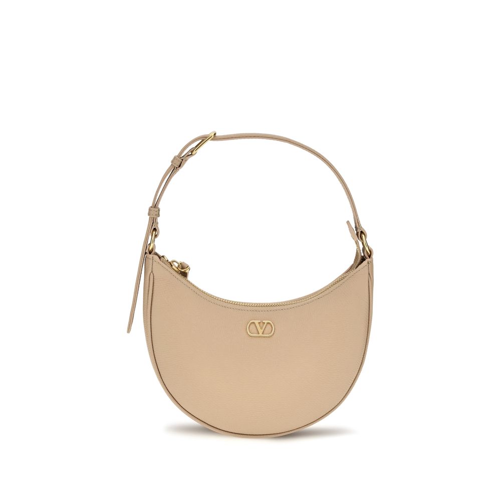 Valentino Garavani VLogo Signature mini hobo bag in beige pink grainy calfskin with antique brass hardware.
