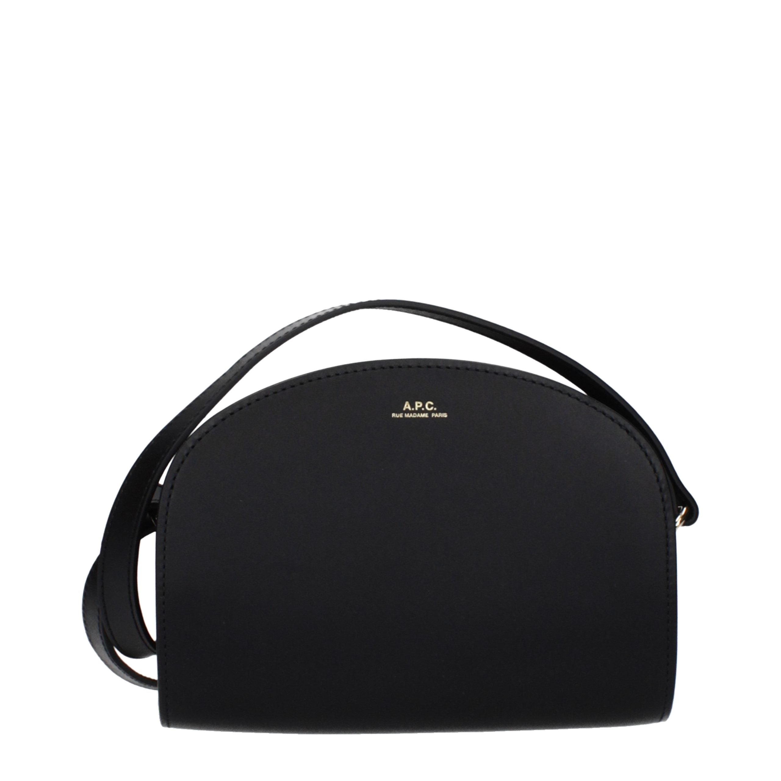 A.P.C. Demi-Lune Mini bag in black leather showing the half-moon shape and gold embossed logo.