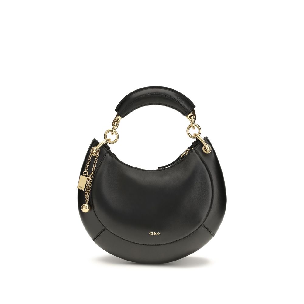 Chloé Banana small hobo bag in black soft nappa lambskin leather featuring a crescent silhouette and streamlined top zip closure from The Exclusive Line Singapore.