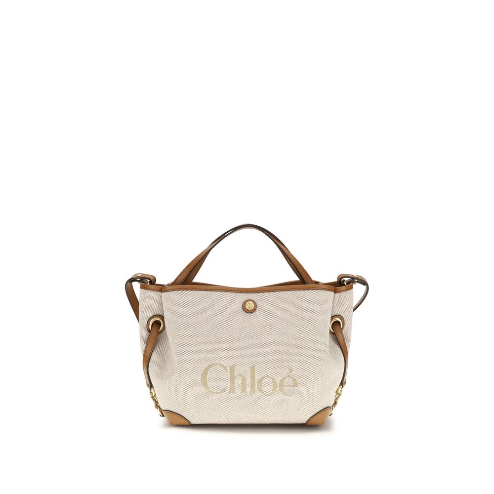 Chloé Clover small double carry bag in clay brown cotton canvas featuring an oversized Chloé logo, brown calfskin trim, and gold-tone hardware.