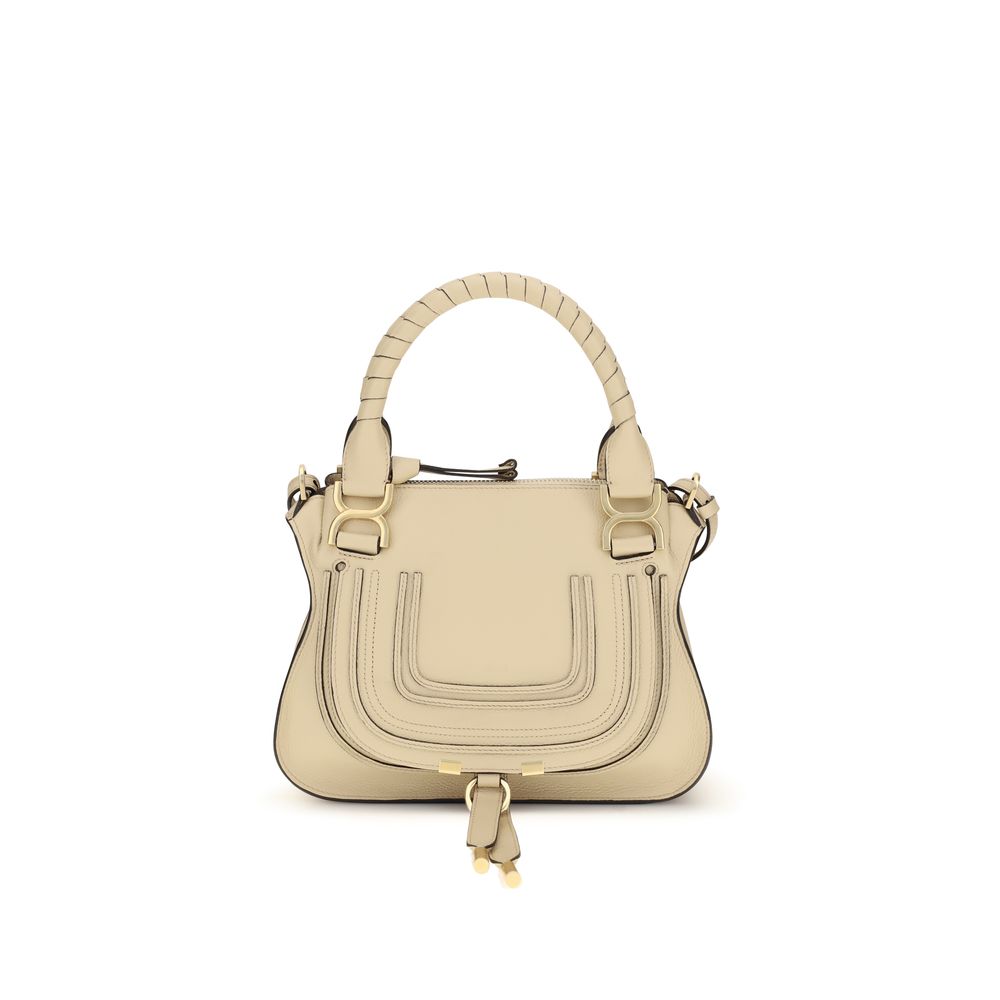 Chloé Marcie small handbag in beige grained calfskin leather featuring hand-wrapped dual top handles, signature front flap, and detachable crossbody strap from The Exclusive Line Singapore.