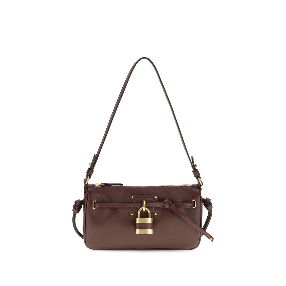 Chloé Paddington Sling Mini Pouch in Burnt Red smooth nappa lambskin with oversized padlock and shoulder strap.