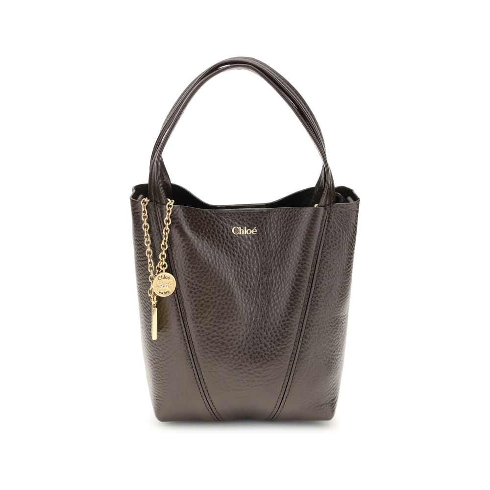 Chloé Spin Tote Bag Small in Kohl Brown Grained Leather with Chloé charms and medal from The Exclusive Line Singapore.