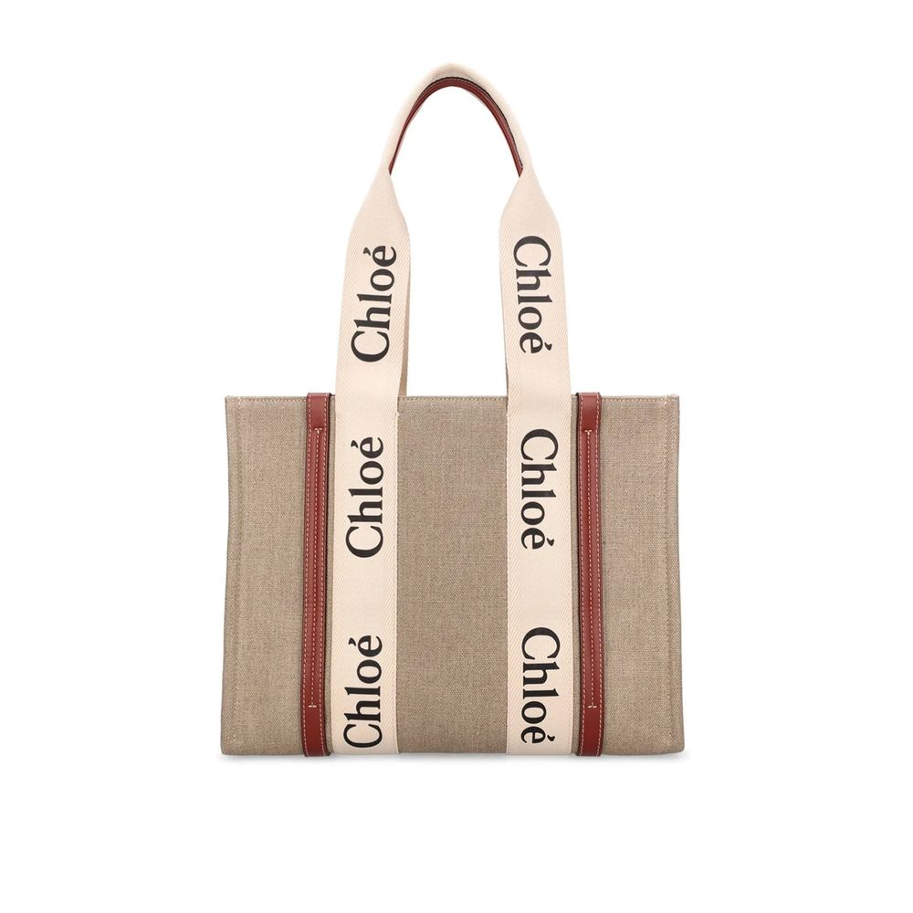 Chloé Woody Tote Bag in Linen Cream and Light Brown from with vertical calfskin strips and logo ribbon.